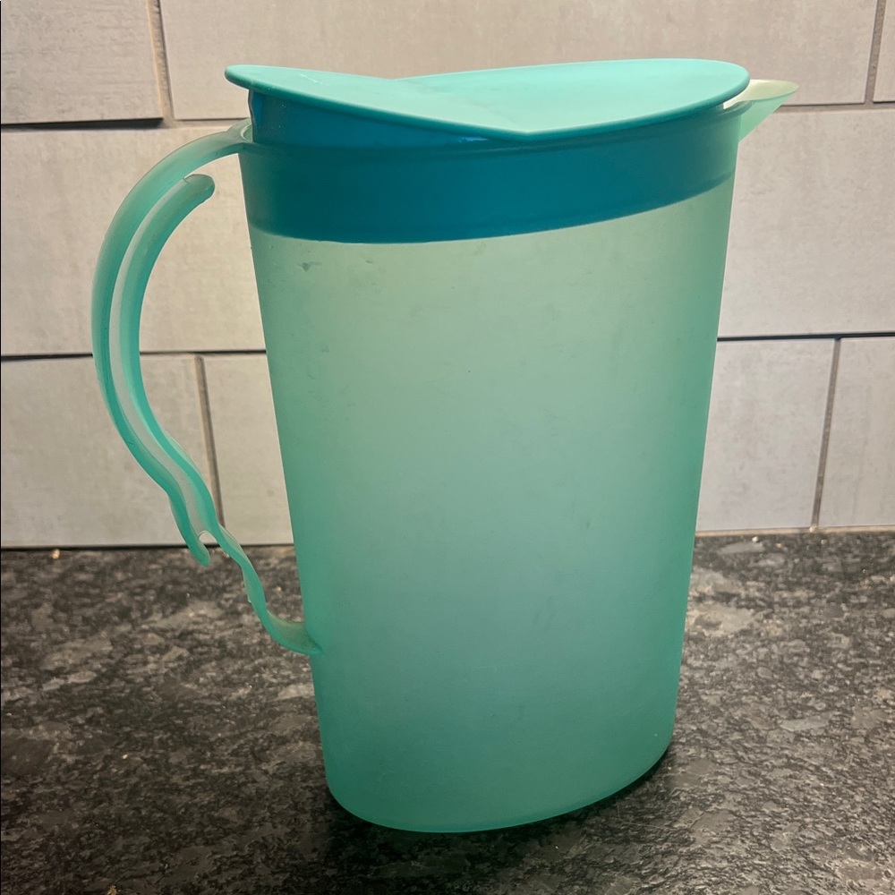Vintage Tupperware slim line Aqua Pitcher. Fits smaller spaces in fridge.
